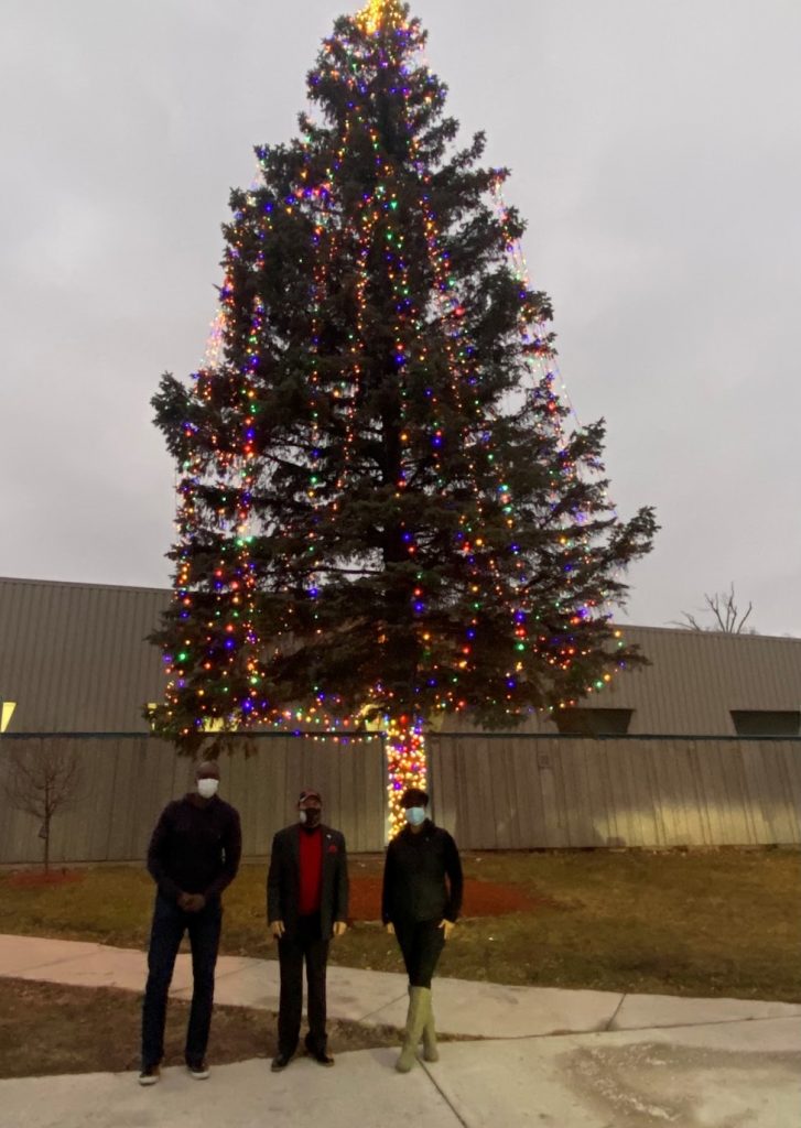 Mayor Sheldon Neeley lights holiday trees at Flint Development Center, Flint City Hall