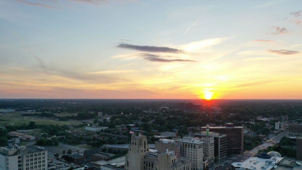 An aerial view of downtown Flint facing the sunrise.
