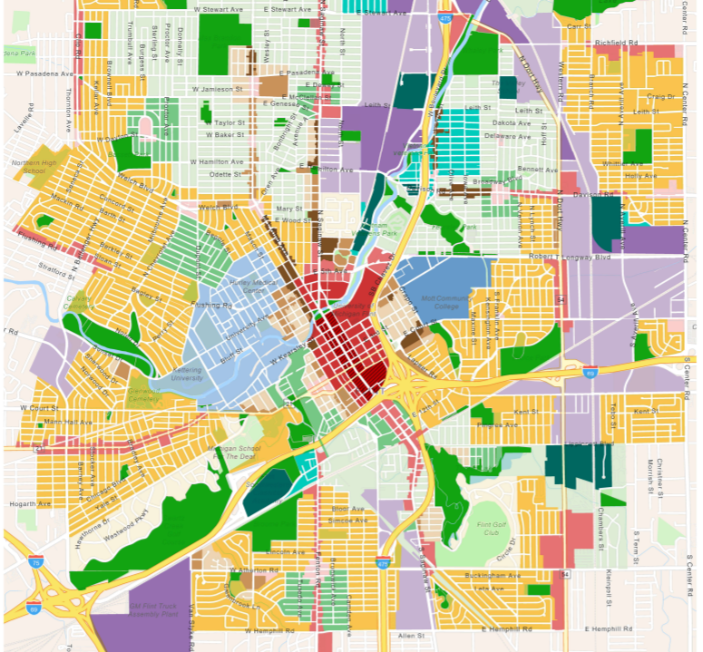 An excerpt from the Zoning Map of the City of Flint, with areas of the City filled with varying colors depending on their zoning district.