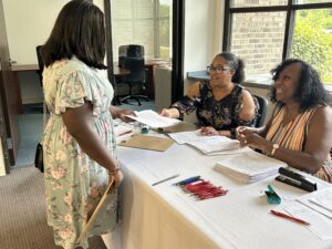Teenager submitting application at the Youth Summer Job Fair