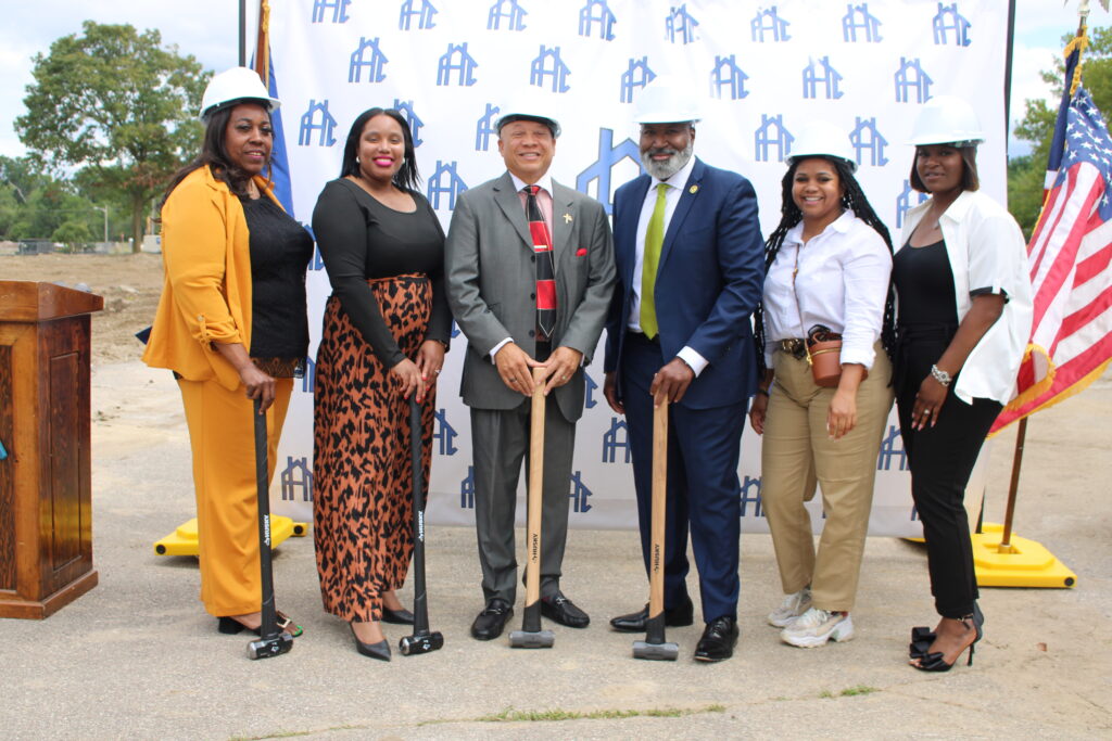 City of Flint and Housing Commission leadership pose during the Atherton East Demolition press conference.