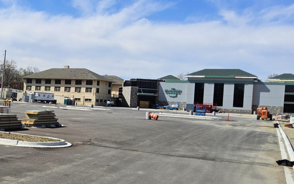 Exterior picture of Berston Fieldhouse renovations showing old and new buildings connecting