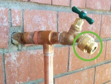 image of an outdoor water spigot with a circle drawn around the nozzle.