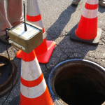 Leak Detection System: An RF transmitter unit sends sound signals through the system to a sensor connected farther along the line.